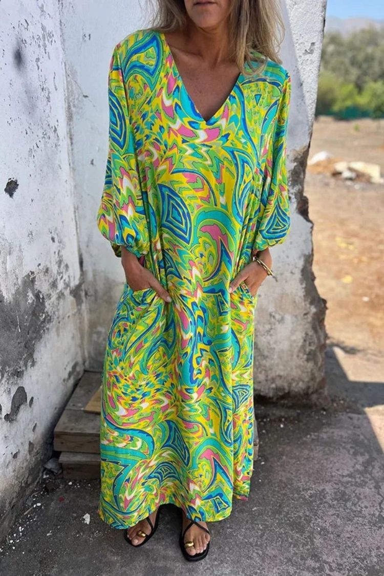 Janeth® | Printed loose sweater dress with V-neck and long sleeves