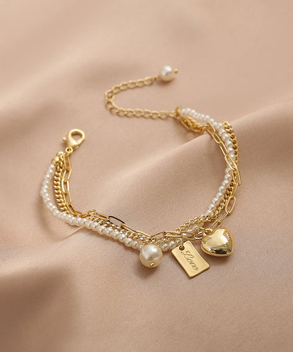 Vogue Gold Metal Alloy Pearl Graphic Love Tassel Charm Braceletfine Silk Sterling Silver Broken Silver Gypsophila Necklace Et008