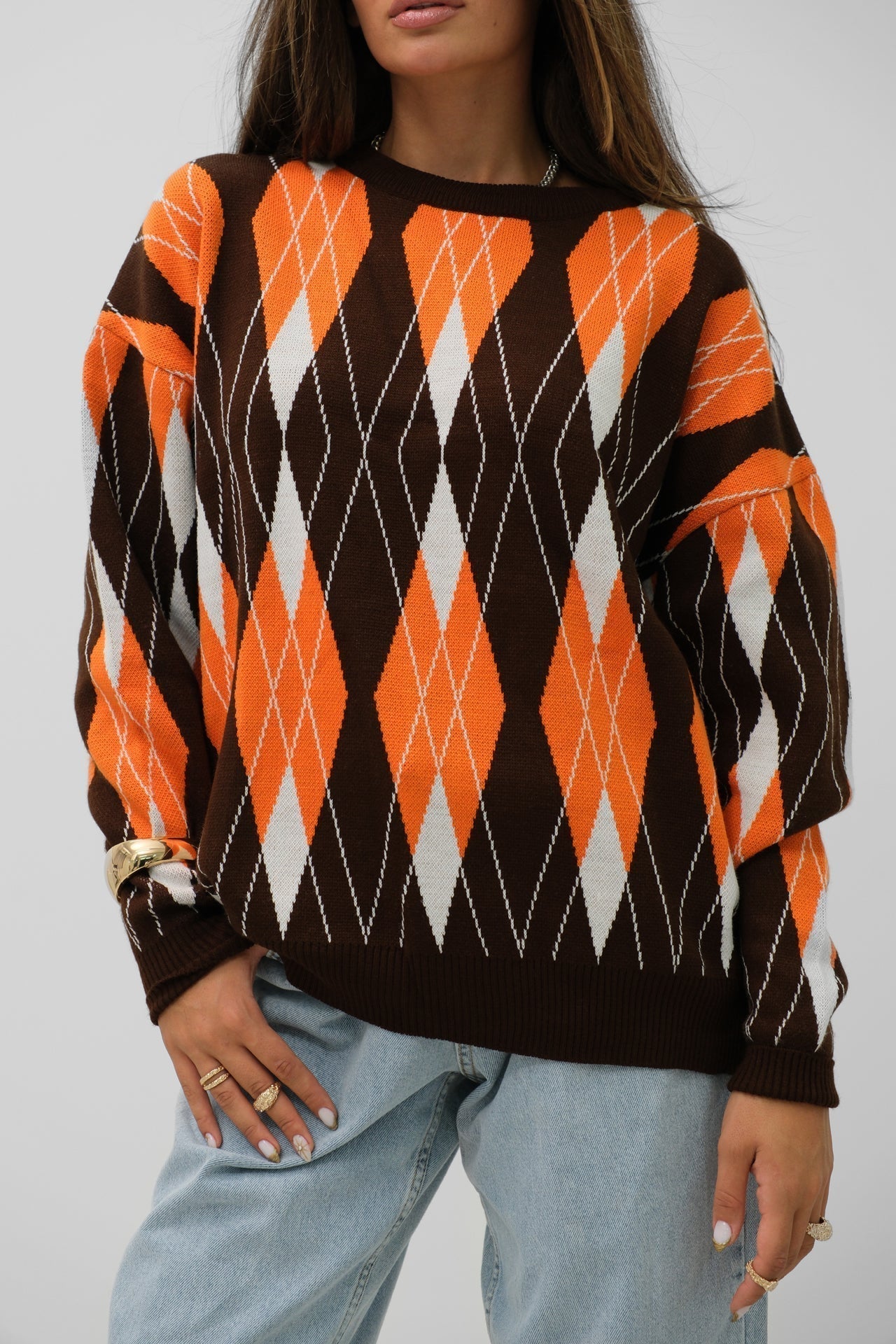 Cecily® | Oversized women's sweater with a baklava pattern in brown and orange